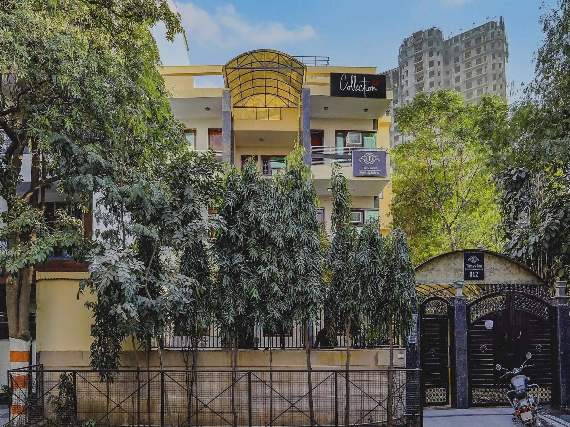 Capital O Uk House Residency Hotel Gurgaon Exterior photo