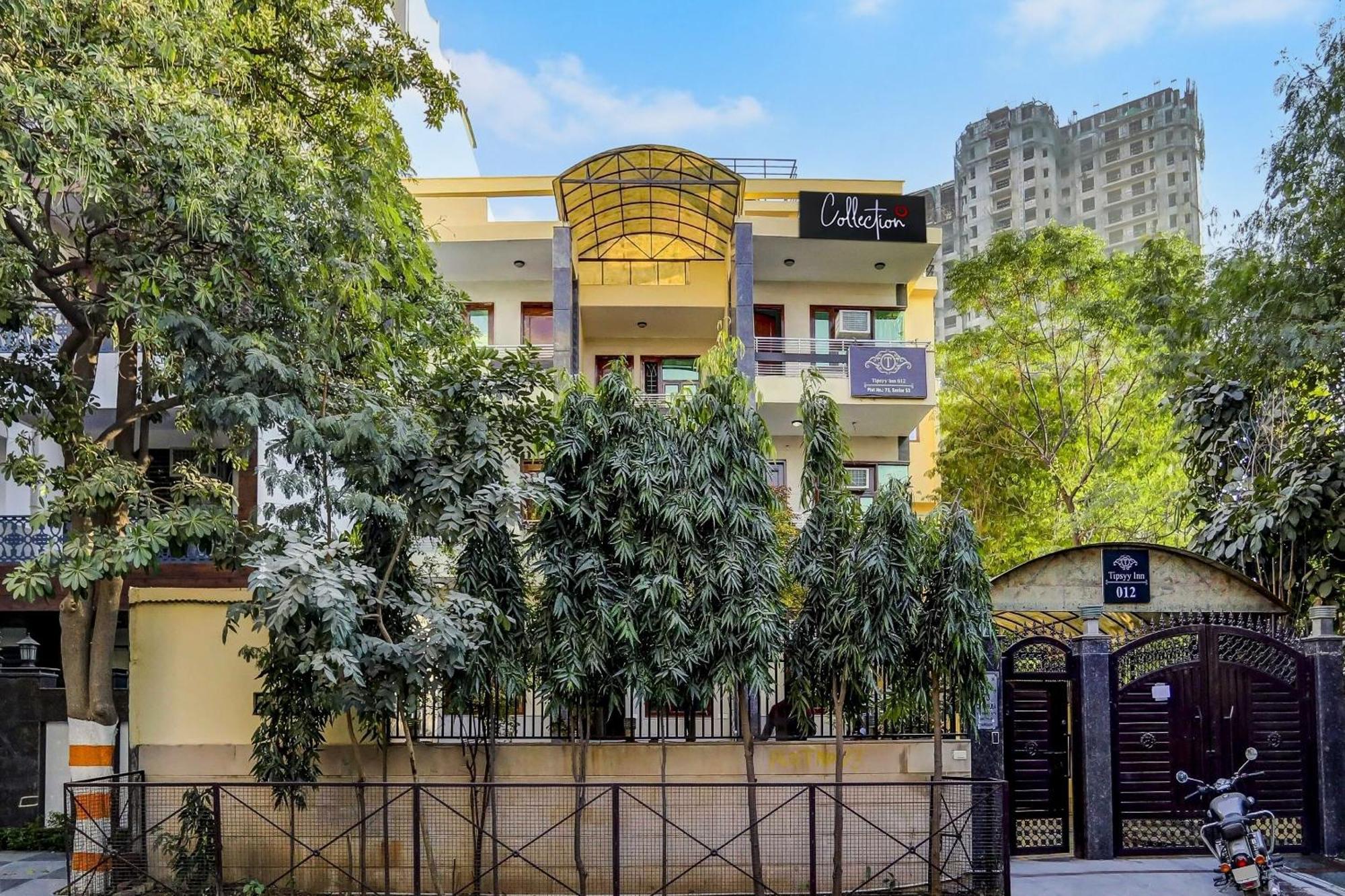 Capital O Uk House Residency Hotel Gurgaon Exterior photo